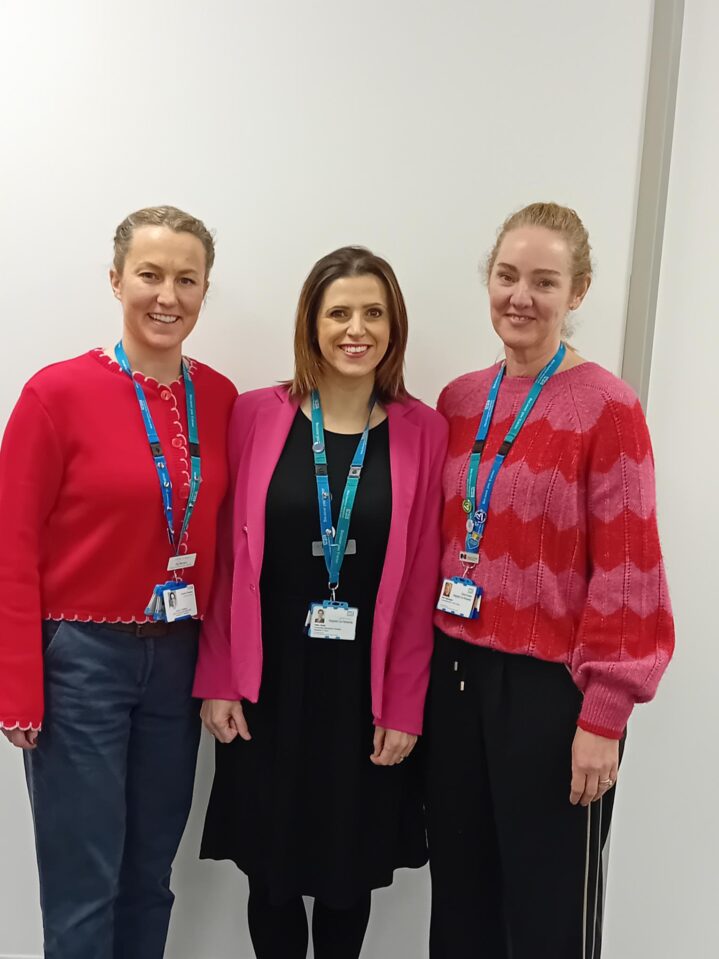 Women wearing red and pink for All Our Hearts Day