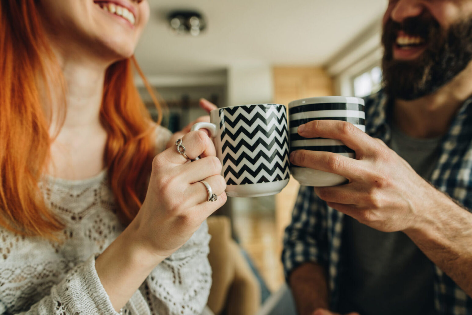 Woman and man enjoying a cup of tea together