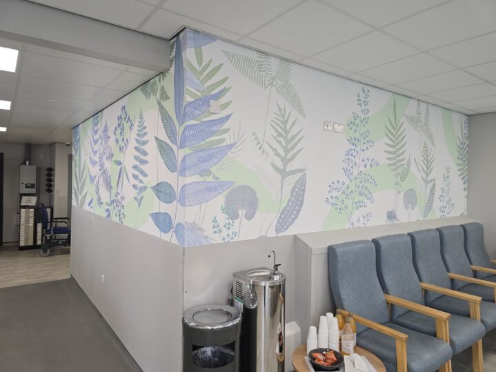 Photo of waiting area with nature based artwork on the walls